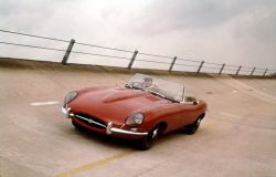 5_1960 Norman Dewis with E-type Series 1.jpg
